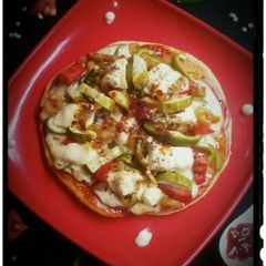 A picture of Paneer pasta pizza.