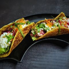 A picture of Moong dal chilla taco.
