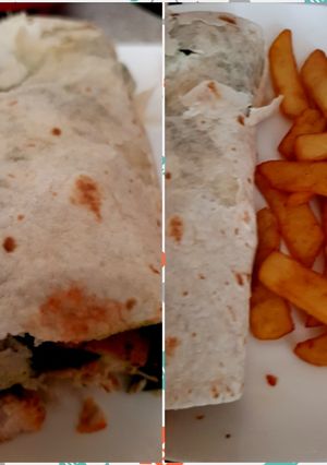 A picture of My Marinated Chicken Strips in a wrap Red Hot Sauce.