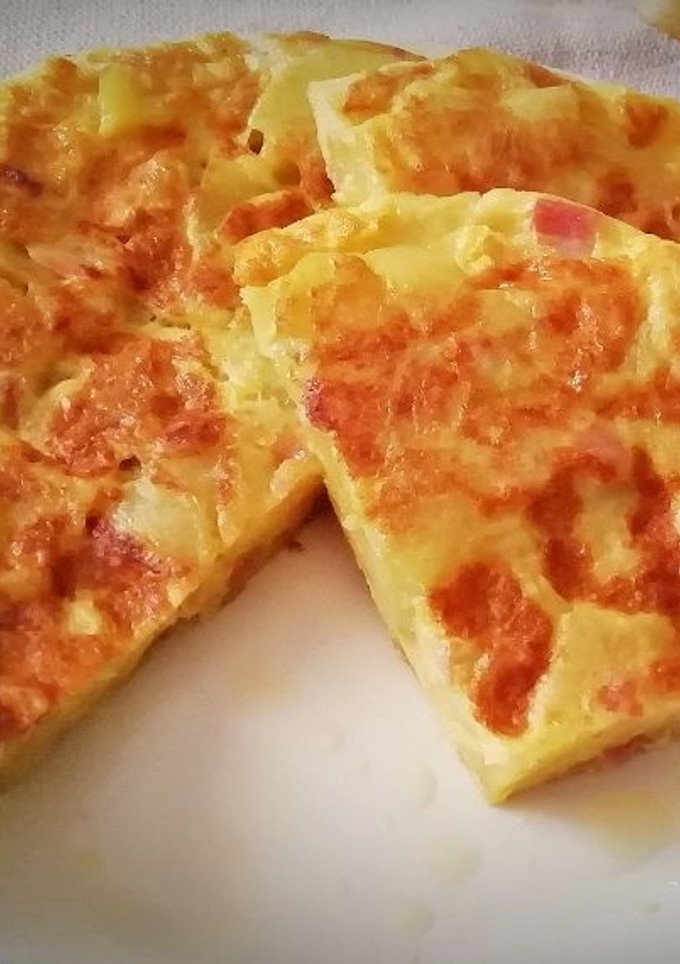 Una foto de Tortilla de Patatas rellena de  Bacon