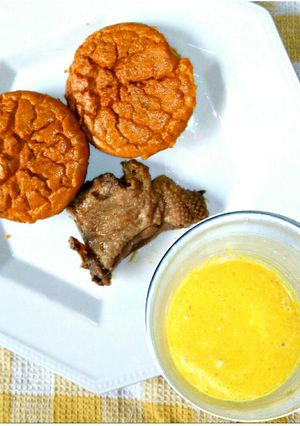 A picture of Keto Oven Baked Moi-Moi and a Piece of Grilled Chicken.