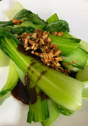 A picture of Stir-fry Bok Choy with crispy garlic and oyster sauce.