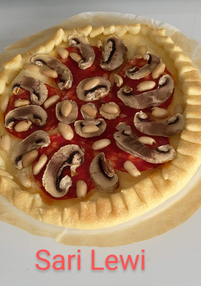 Una foto de Pizza en Horno microondas (5 ingredientes)
