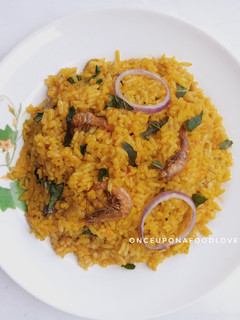 A picture of Palmoil Rice (Native Jollof Rice).