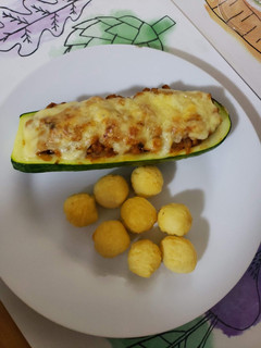 Una foto de Zapallo italiano relleno vegetariano