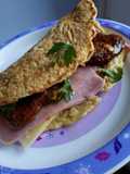 Ham, cheese and chilli sun-dried tomato Oat omelette wrap