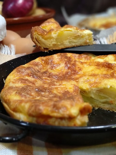 Una foto de Quiche de tortilla de patata