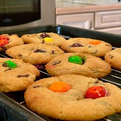 A picture of Rainbow cookiesWith Skittles 🌈.