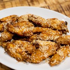 A picture of Japanese-style sweet fried chicken wings.