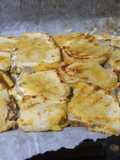 Cuadraditos de chuletas de cerdo con queso