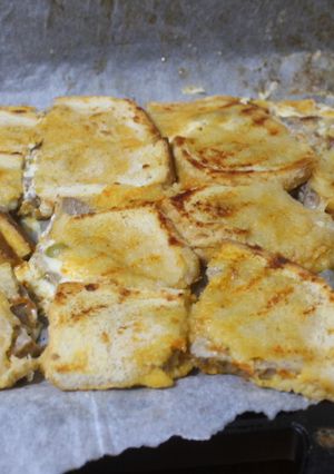 Una foto de Cuadraditos de chuletas de cerdo con queso