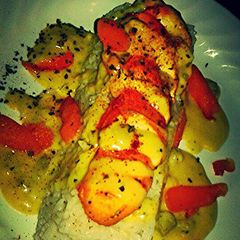 A picture of Rosemary Chicken & Rice w/ Broccoli and Cheese Sauce.
