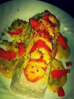 A picture of Rosemary Chicken & Rice w/ Broccoli and Cheese Sauce.