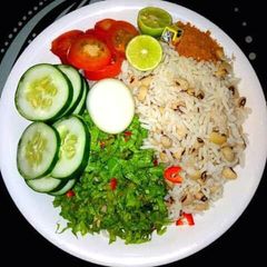 A picture of Rice and Beans with veggies.