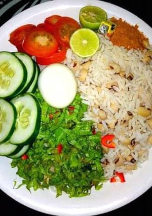 A picture of Rice and Beans with veggies.