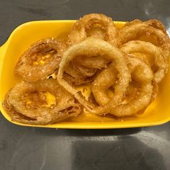 A picture of Perfect Onion Rings - Great side dish or with a beer - so simple and amazing :P Enjoy :P.