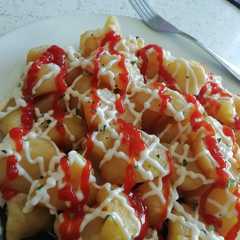 Una foto de Papas bravas
