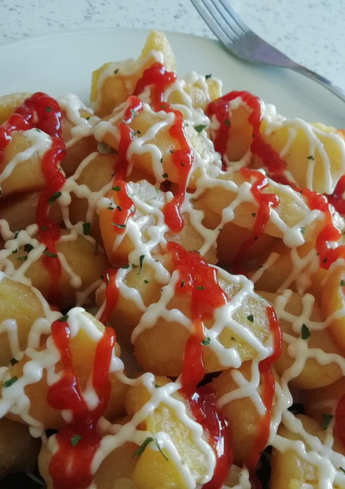 Una foto de Papas bravas