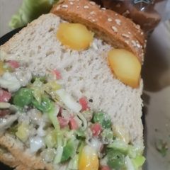 A picture of Chicken veggies sandwich.