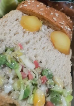 A picture of Chicken veggies sandwich.