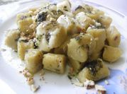 Una foto de ñoquis de batata