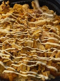 Una foto de Arroz basmati al curry con carne de kebab