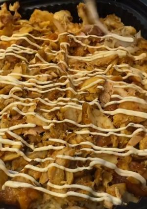 Una foto de Arroz basmati al curry con carne de kebab