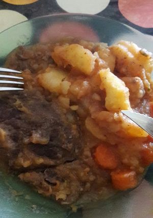 Una foto de Bifes a criolla