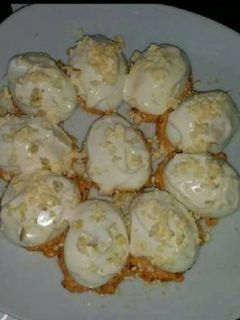 Una foto de Huevos con cebolla caramelizada
