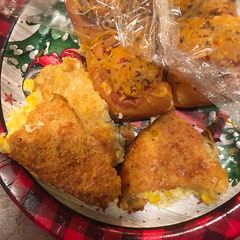 A picture of Corn with cheese.