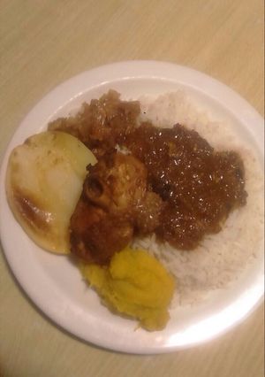 A picture of Grilled turkey with rice.