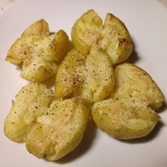 Parmesan smashed new potatoes A picture of Parmesan smashed new potatoes.