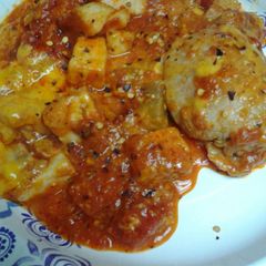 A picture of Eggplant casserole stove top.