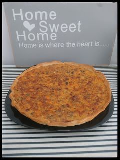 Una foto de Quiche de carne y champiñones