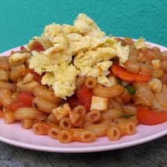 A picture of Macaroni with Orinji Mushroom and Tomato Sauce.