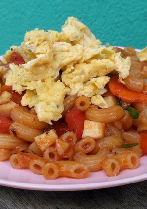 A picture of Macaroni with Orinji Mushroom and Tomato Sauce.