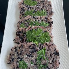 A picture of Roasted Pan Purple Sticky Rice With Egg.