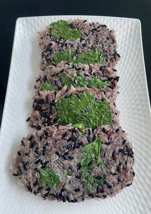A picture of Roasted Pan Purple Sticky Rice With Egg.