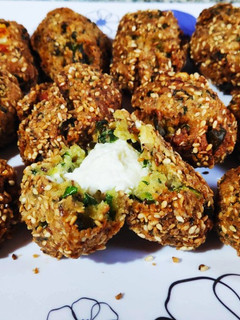 Una foto de Croquetas Crunch de espinaca y queso
