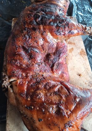 Una foto de Lechón asado a la parrilla