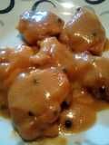 Muslo de pollo en salsa de pimienta verde