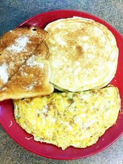 A picture of omlet and pancakes.