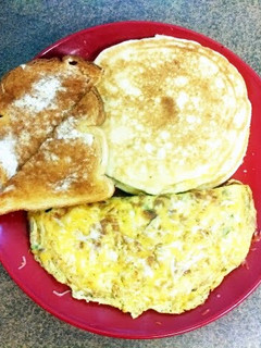 A picture of omlet and pancakes.