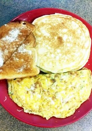 A picture of omlet and pancakes.