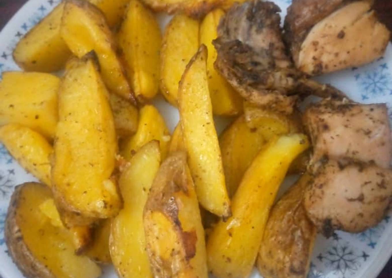 Baked Irish Potatoes and peppered chicken