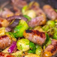 Pig in Blankets and Brussel sprouts with sweet plum sauce A picture of Pig in Blankets and Brussel sprouts with sweet plum sauce.