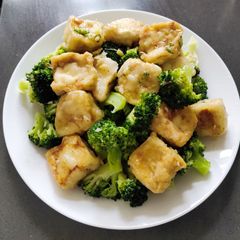 A picture of Sauteed Broccoli with Fried Tofu.
