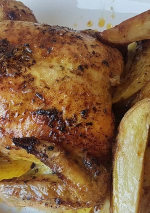 Foto principal de Pollo al horno con patatas