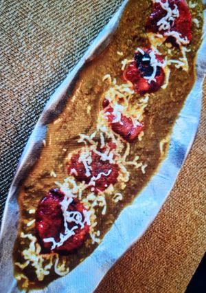 A picture of Beet Root Kofta In Spinach Gravy.