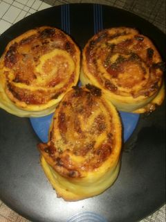 Una foto de Rollitos de pizza